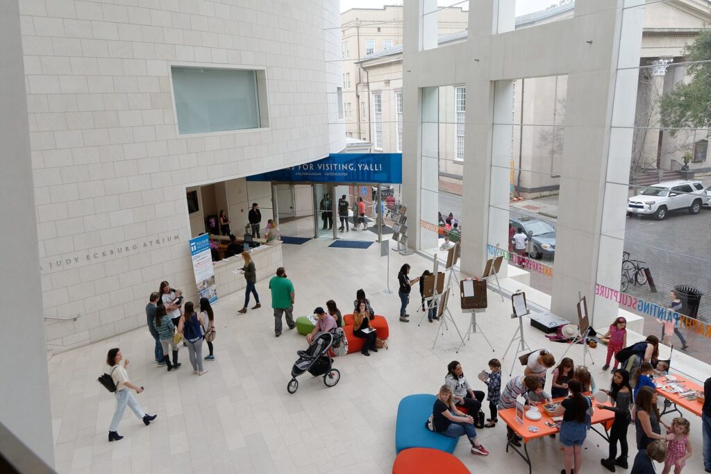 Accessible Savannah travel guide: visitors, children and a stroller in the open, step-free lobby of the Jepson Center