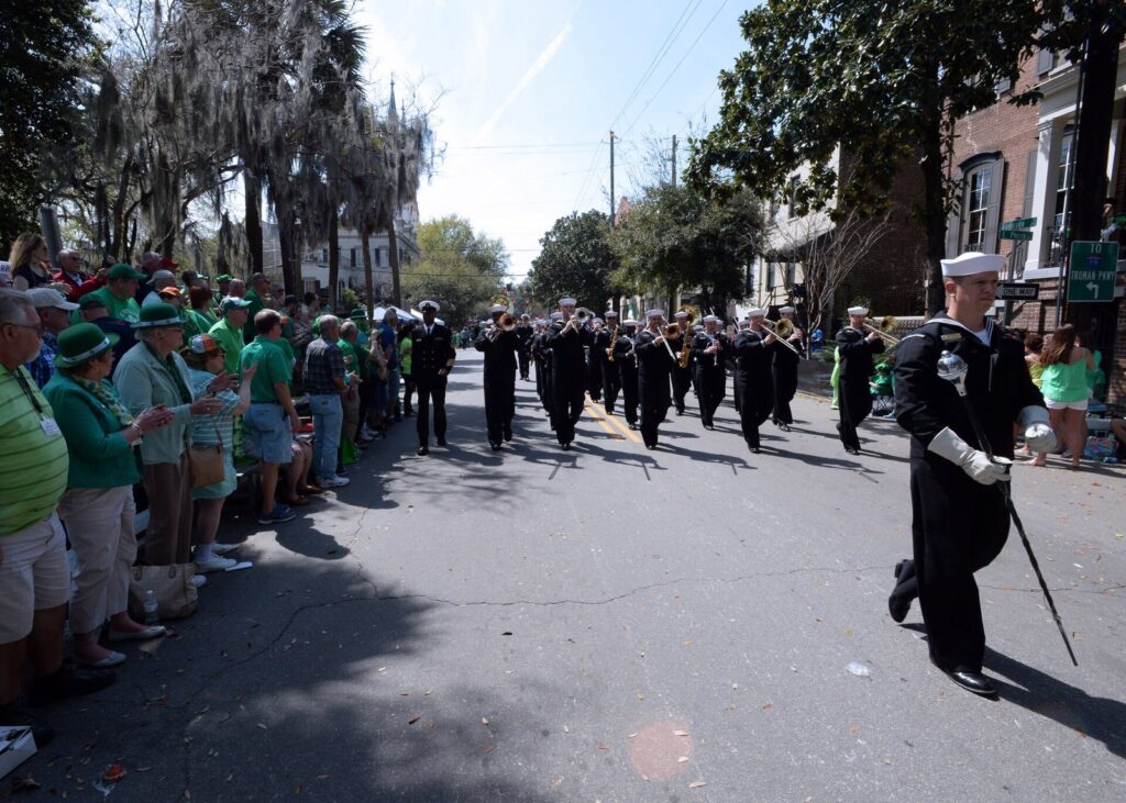 Savannah events and festivals: a U.S. Navy band marches between crowds dressed in green at Savannah's St. Patrick's Day parade